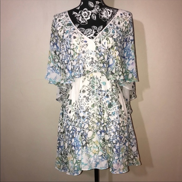 Free People Dresses & Skirts - Free People Floral Sparks Fly Mini Cape Dress